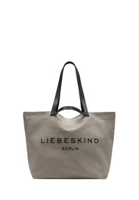 Beżowa torba na ramię z płótna z czarnymi skórzanymi uchwytami i wyraźnym czarnym napisem "LIEBESKIND BERLIN" nadrukowanym z przodu.