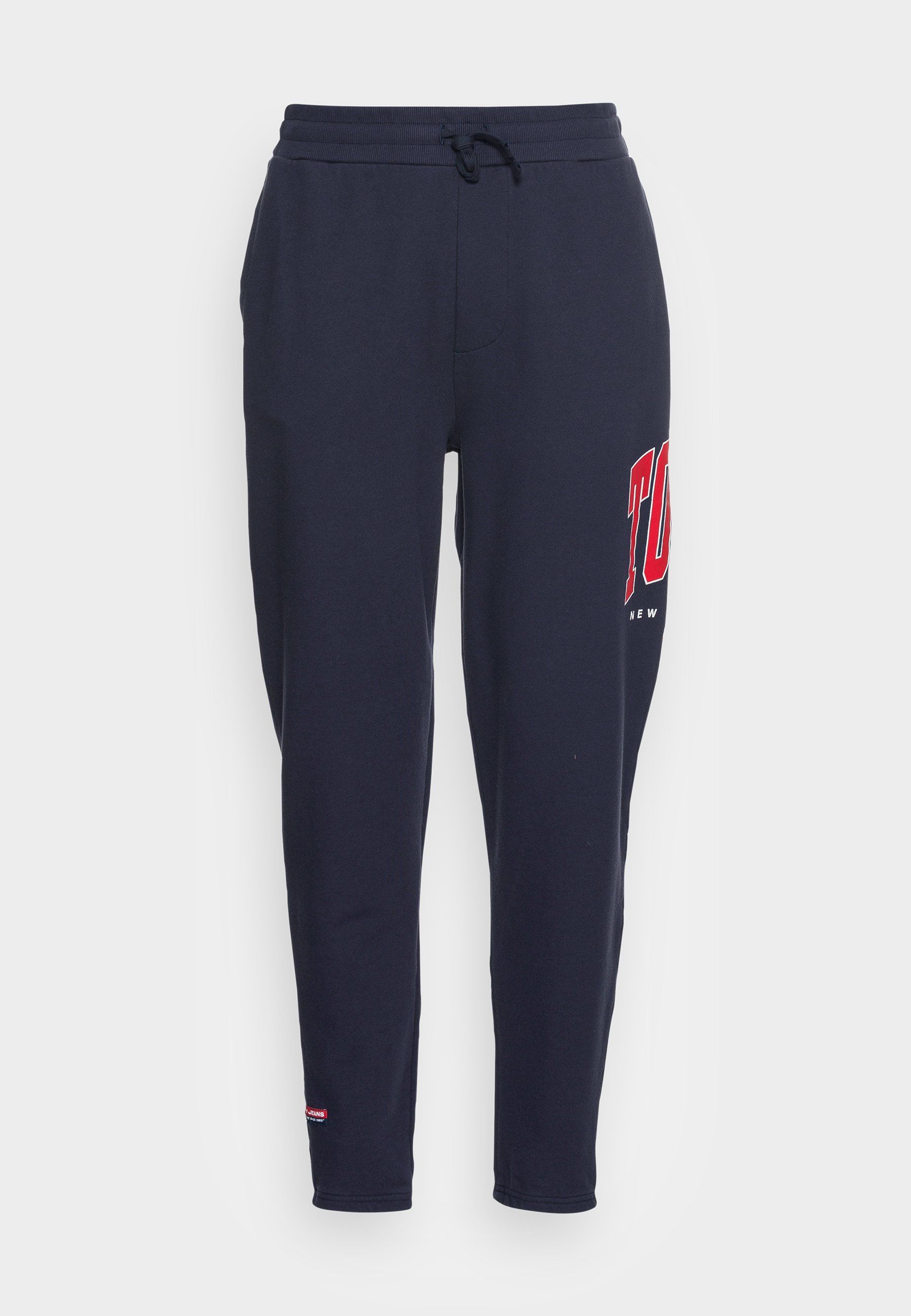 Tommy Jeans TJM COLLEGE ARCHIVE PANT - Teplákové kalhoty - twilight navy