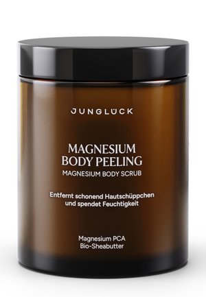Amber glass jar with a black lid. White text displays product name: "Magnesium Body Peeling" and additional details in German.