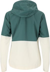 Windbreakerjack met een teal bovenstuk en een crèmekleurig onderstuk, inclusief een capuchon en lange mouwen met een gladde textuur.