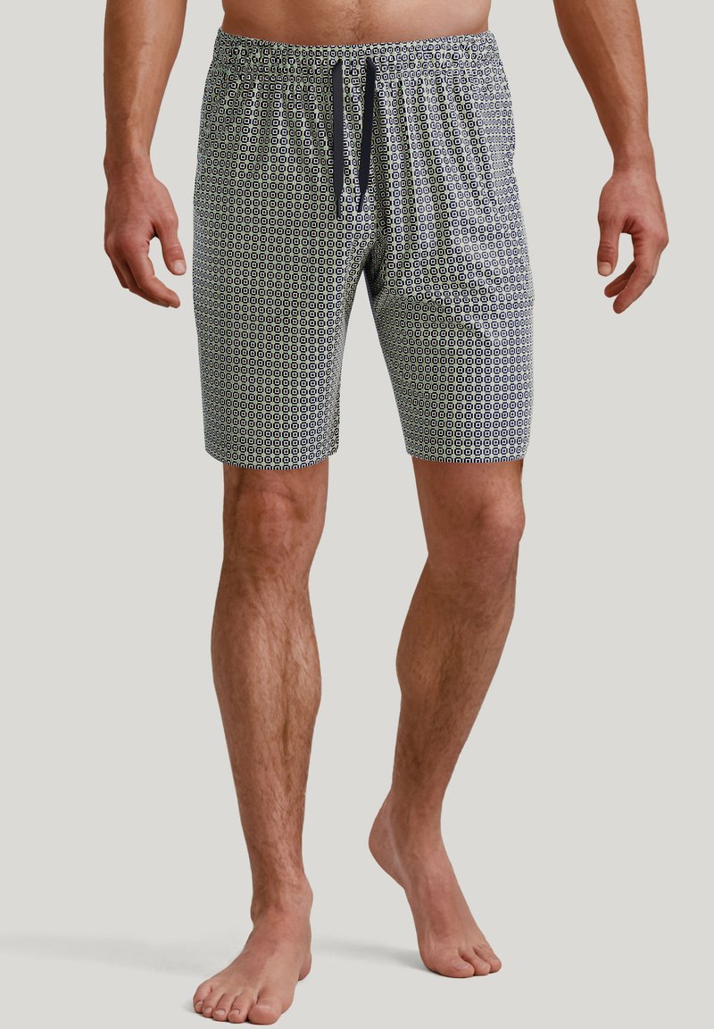 Men's swim shorts in a patterned fabric with navy blue and white geometric designs. Features an elastic waistband with drawstring.