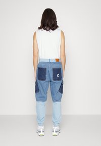 Karl Kani Vaqueros tapered - blue