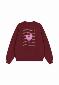 Bordeaux sweatshirt met een glimlachend hartontwerp op de achterkant en de tekst "GOOD KARMA CLUB" in het wit, van zachte stof en met geribde manchetten.