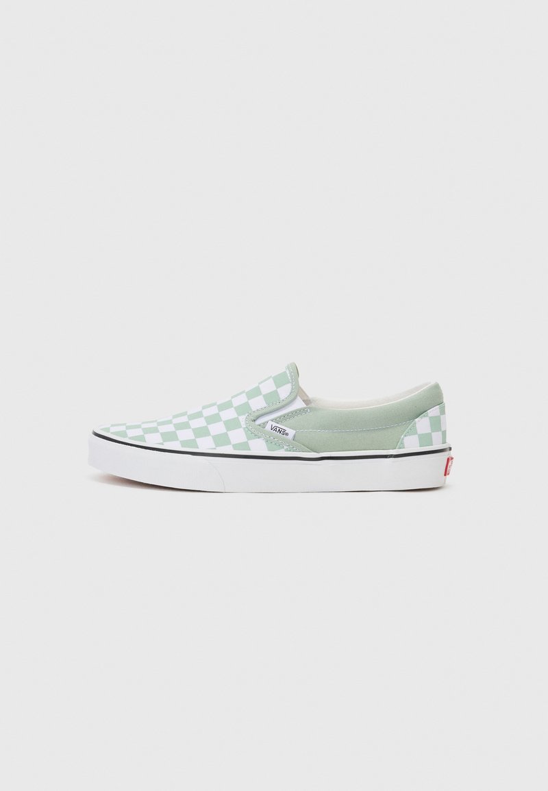 Light green slip-on shoes with a checkerboard pattern, padded collar, white rubber sole, and Vans logo tag on the side.