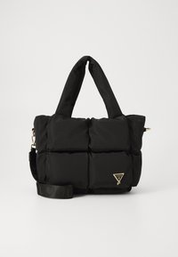 Black nylon bag with quilted design, dual handles, and adjustable strap. Features a gold logo plaque and textured accents.