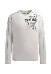 Hellgrauer Langarmpullover mit Rundhalsausschnitt, der auf der Vorderseite mit schwarzen Text- und Grafikanzeigen bedruckt ist. Gerippte Bündchen und Saum.