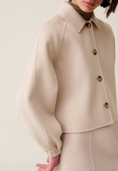 Claudie Pierlot Chaqueta de entretiempo - beige