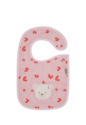 Pink baby bib with red heart patterns and an embroidered white bear face with a flower on its ear, secured with snap buttons.