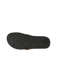 Flache schwarze Gummisandalen-Sohle mit einem strukturierten Griffmuster. Verfügt über ein oberes Material in Tan-Farbe und keine sichtbaren Materialien oder Akzente.