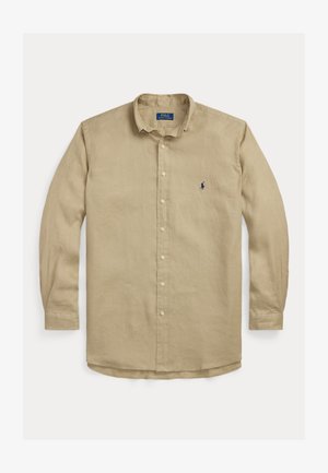 Camisa de manga larga beige hecha de lino, con cuello clásico, cierre de botones en el frente y logo bordado en el lado izquierdo del pecho.