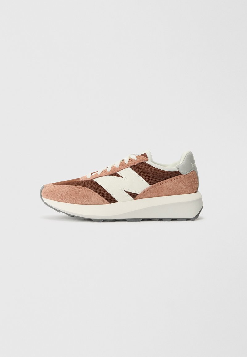 Sneakers in brown and peach suede with white nylon accents and logo, featuring a thick white midsole and gray rubber outsole.