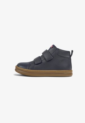 Navy leather high-top shoes with two adjustable Velcro straps, rounded toe, stitched details, and a gum rubber sole.