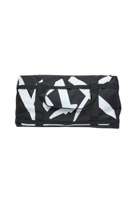 Black duffel bag with large white abstract geometric pattern. Features two sturdy handles and a zipper closure. Textured fabric.