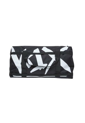 Black duffel bag with large white abstract geometric pattern. Features two sturdy handles and a zipper closure. Textured fabric.