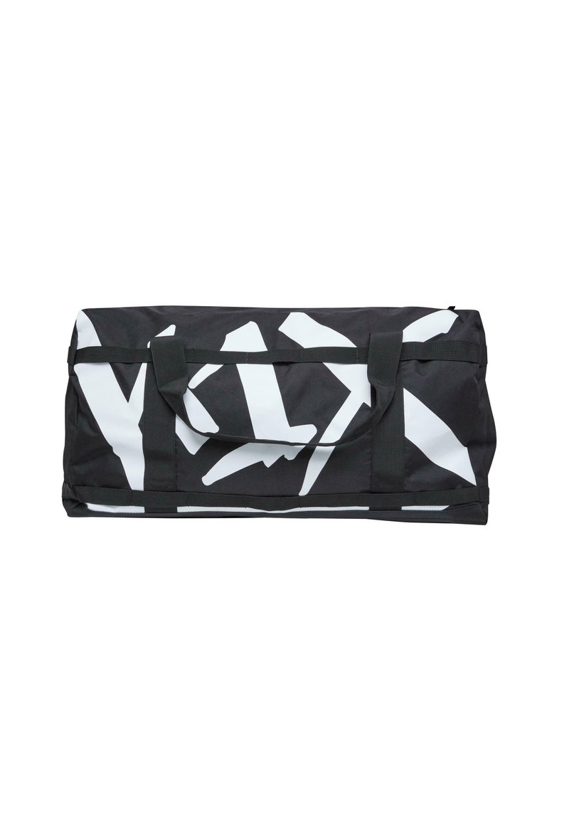 Black duffel bag with large white abstract geometric pattern. Features two sturdy handles and a zipper closure. Textured fabric.