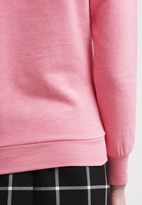 TWINTIP Jersey con capucha - pink melange