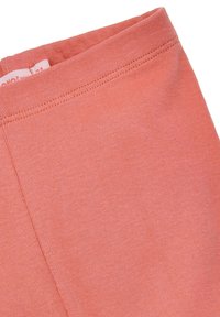 Leggings rose en tissu doux et extensible avec une finition lisse. Caractéristiques d'une large ceinture élastique pour le confort et la facilité de port.