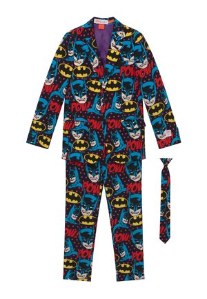 Batman-inspiriertes Anzug mit kräftigen Mustern, die Charaktere, gelbe Fledermaus-Symbole und lebendige Farben zeigen. Enthält eine passende Krawatte. Punkten Hintergrund.