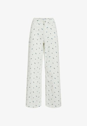 Pantalon large blanc orné de petits motifs floraux bleus, avec une fermeture à bouton et des poches avant. Idéal pour un style décontracté.