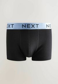 Črne bokserice iz mehkega materiala z svetlo modrim elastičnim pasom, na katerem je s črnim tiskanjem napisano "NEXT".