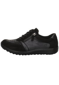Black athletic shoes feature a mix of leather and suede, with a textured toe box and a side zipper for ease. Rubber sole for traction.