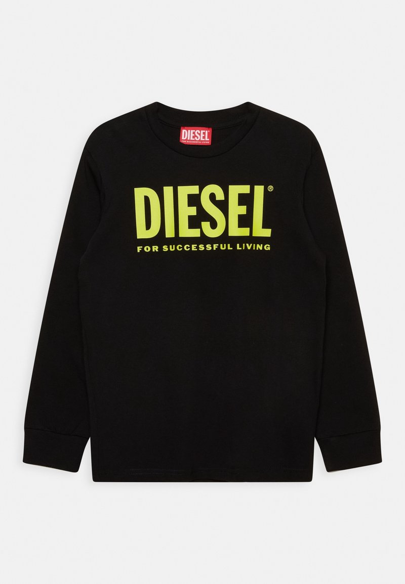 Černé dlouhé rukávy tričko vyrobené z bavlny. Na přední straně se nachází jasně žluté logo "DIESEL" a slogan "PRO ÚSPĚŠNÝ ŽIVOT" v tučném písmu.