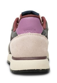 Athletic shoe with a multicolored upper featuring gray, pink, and maroon suede. Rounded heel, textured overlays, and a low-profile rubber sole.