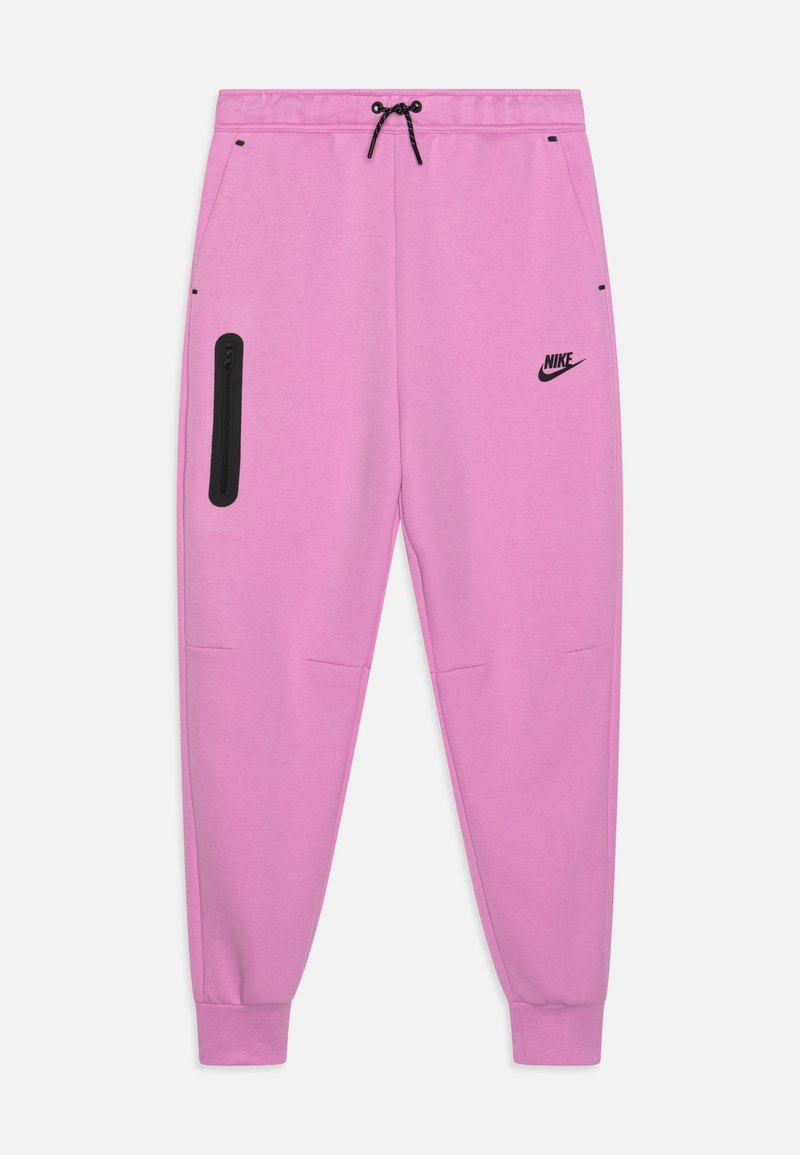 Nike joggers spilgtā rozā krāsā, izgatavoti no mīksta auduma, ar melnu rāvējslēdzēja kabatu sānos un elastīgu jostasvietu ar auklu.