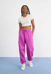 Nike Sportswear PANT  - Treniņtērpa apakšdaļas - hot fuchsia