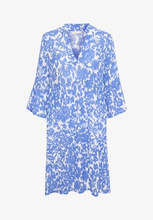 Zila un balta ziedu raksta kleita ar V veida kaklu, izplestām piedurknēm un pakāpenisku dizainu. Izgatavota no viegla, tekstūrēta auduma.