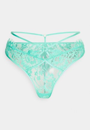 Teal lace thong with floral pattern, featuring thin adjustable straps and a mesh panel, creating a delicate and intricate design.