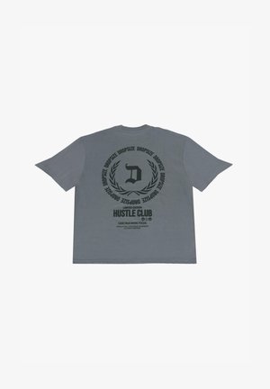 Graues Baumwoll-T-Shirt mit einem großen schwarzen Grafikdesign auf der Rückseite, das Text und ein Logo in einer kreisförmigen Gestaltung zeigt. Lockerer Schnitt, kurze Ärmel.