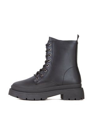 Stivaletti con plateau - nero