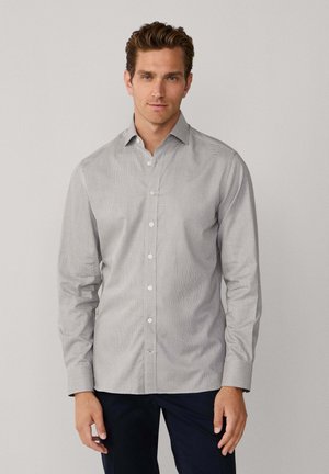 Grijs-wit geruit overhemd met lange mouwen, een button-down kraag en een voorplooibare sluiting, gemaakt van gladde stof en met omslagmouwen.