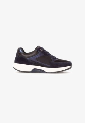 Navy blue sneaker with suede and mesh panels, lace-up design, textured accents, and a contrasting white midsole. Rubber outsole.