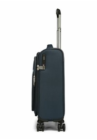 Valise navy avec une coque rigide, une poignée rétractable, un cadenas à combinaison et quatre roues pour la mobilité. Détail de surface texturée.