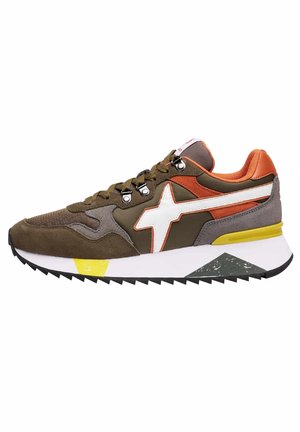 Brown and orange sneaker with white star logo, yellow and gray accents, suede and mesh panels, and jagged black sole.