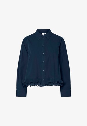 Blouse boutonnée à manches longues bleu marine foncé avec col et détail de bas rufflé.