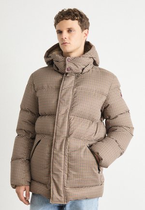 Brown and beige checkered puffer jacket with a zippered front, high collar, and hood. Features side pockets and a quilted texture.