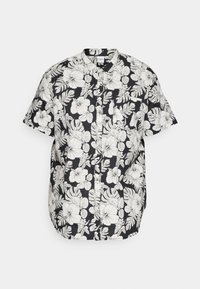 Camisetta nera a maniche corte con motivi floreali e foglie bianchi, design con bottoni e tasca sul petto con orlo curvo.