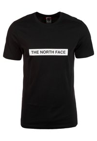 Camiseta de algodón negra de manga corta, con un logotipo rectangular blanco que dice "THE NORTH FACE" centrado en la parte delantera.