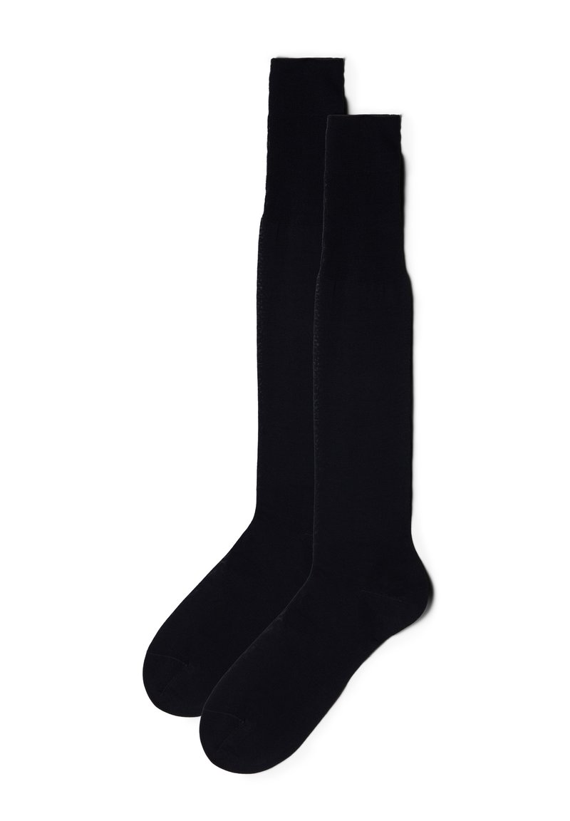  Sorte lårhøje strømper med en glat tekstur og forstærket tå, der har et sømløst design og elastisk kant for en god pasform.