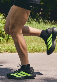 ADIZERO EVO SL W - Chaussures de running sur route - core black/lucid lemon/iron