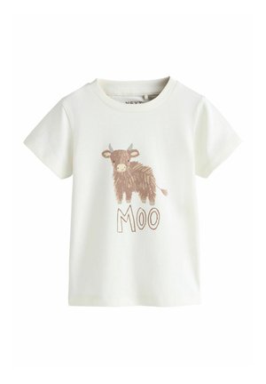 Valkoinen lasten t-paita, jossa on ruskea sarjakuvamainen lehmä ja eläimen alapuolella edessä sana "MOO".