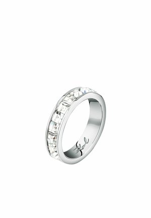 Silver ring featuring a row of rectangular clear crystals, with a polished smooth band and subtle branding on the inner surface.