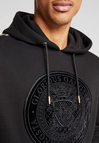 Glorious Gangsta Jersey con capucha - black