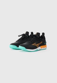 Black athletic shoes with a textured upper, featuring orange accents and a turquoise sole. Laces and pull tabs complete the design.