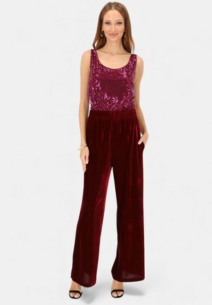 - Spodnie materiałowe