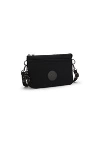 Sort nylon crossbody taske med lynlåslukning, justerbar rem og et rundt logoudtryk. Indeholder en aftagelig nøglekæde tilbehør.