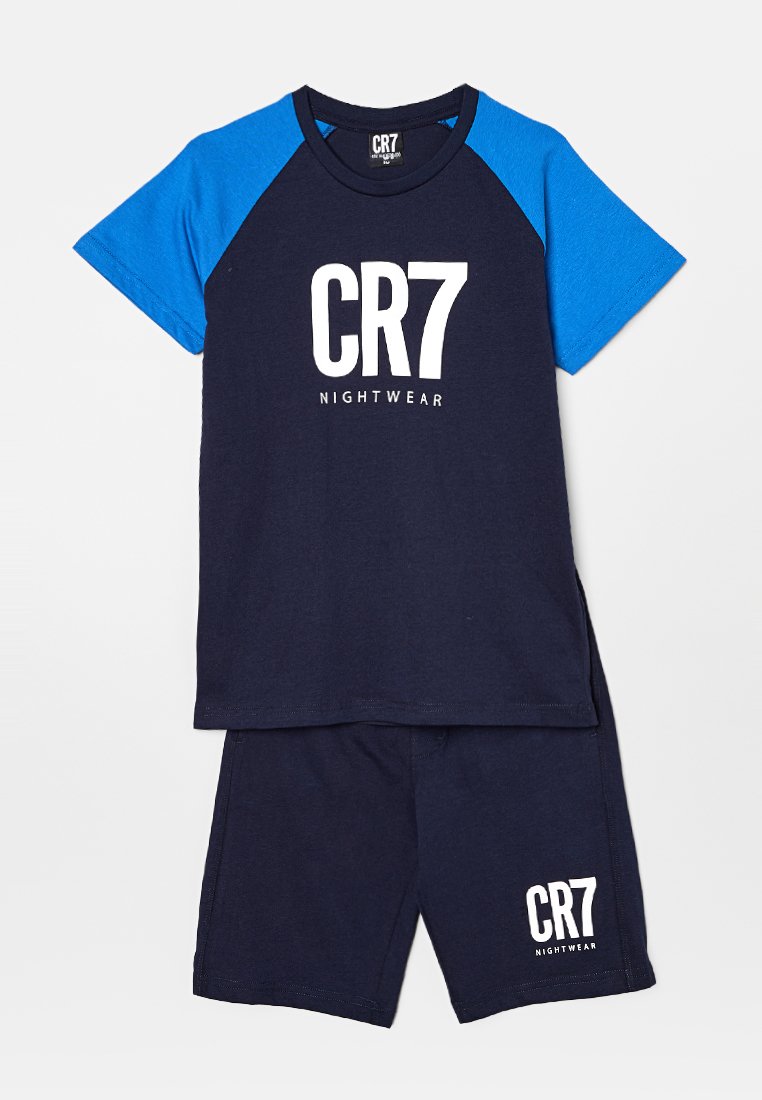 Ensemble de nuit en coton marine comprenant un t-shirt à manches courtes avec des manches raglan bleues et une impression blanche "CR7 NIGHTWEAR", associé à un short assorti.